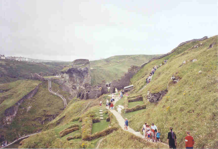 Ruins at Tintagel, Cornwall.  The recently excavated foundations in the foreground date to Arthur's time (5th century).  The ruins of the castle in the background were built centuries later, when Arthur was already a legend.