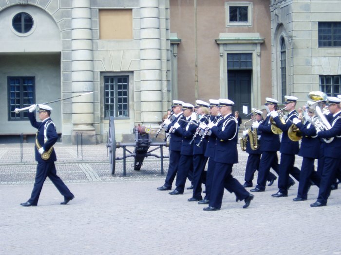 Military band parading at the palace