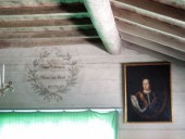 Inside an old Skansen house – note the date carved on the wall: 1673